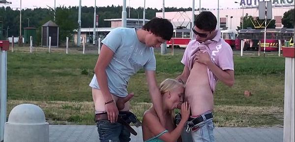  A young blonde pretty girl in public threesome gang bang
